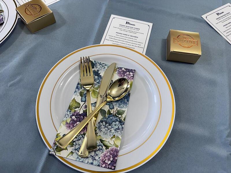 Place setting for a private event by Alley Cat Oyster Bar