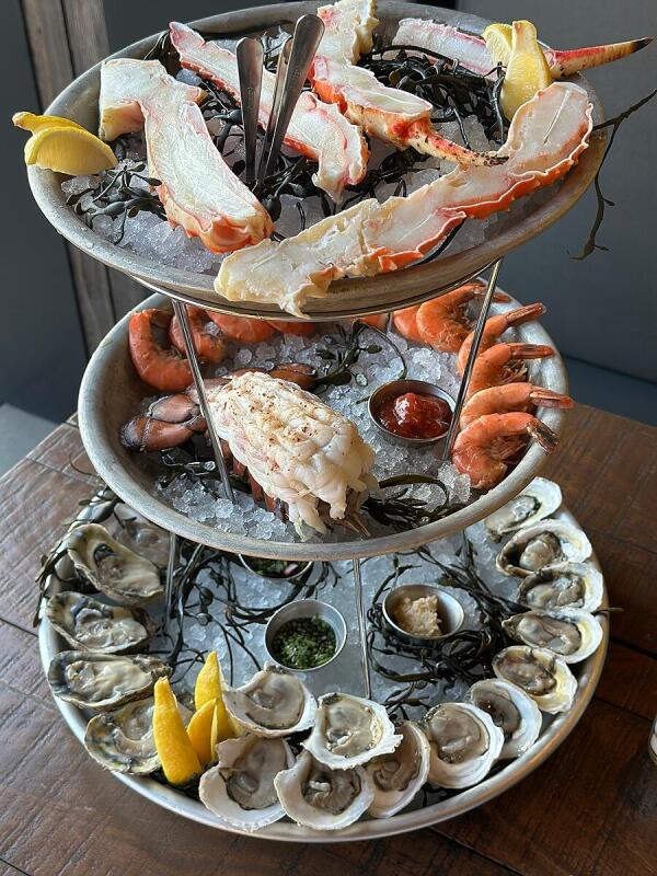 Oysters, shrimp, and crab legs catered by Alley Cat Oyster Bar